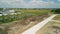 Wide Aerial shot of suburb in pre construction empty lots and home