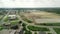 Wide Aerial of suburb in pre construction empty lots and home