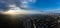 Wide aerial sunrise panorama above Kharkiv city