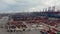 Wide aerial view of cranes sorting containers in large cargo port in Hamburg, Germany