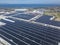 Wide aerial view of a massive building in Cavite Export Processing Zone in Rosario, Cavite, Philippines. The roof is installed