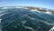 Wide angle fiseye len tourist taking photo on False bay near Cape town seal island South Africa