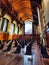 A wide-angle image of raws of chairs at the University of Canterbury main assembly hall