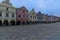 Wide-angle landscape view of colorful facade of historical buildings on the market square in Telc, the Czech Republic