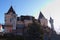 Wide angle landscape view of Kyiv Academic Puppet Theatre during sunrise. Blue sky in the background