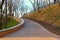 Wide angle landscape view of wide curved smooth descent by staircase. Famous city park - Saint Vladimir Hill
