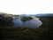 Wide angle panorama of Cuicocha caldera crater lake Cotacachi volcano Otavalo Andes mountains Imbabura Ecuador