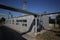 Wide-angle panoramic photo of the newest alternative fuel boiler room with pipes, towers and tanks, on a clear summer day