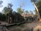 Wide angle picture of outside temple ruins of angkor wat, with ancient door, entry hallway, cambodia