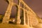 Wide angle shot of antique roman aqueduct