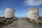 A wide angle shot from the base of an abandoned windmill