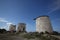 A wide angle shot from the base of an abandoned windmill