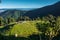 A wide angle shot of Camping in the hills of Himalayan region of Uttarakhand, India with visible Gomukh Glacier peaks in the