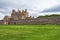 Wide angle shot of Castle of Mey in Caithness, Scotland with a manicured lawn
