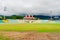 Wide angle shot of the famed dharamshala cricket stadium the worlds highest altitude stadium a tourism hotspot and