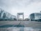 Wide-angle shot of the Grande Arche on an overcast day in Paris, France