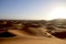 Wide angle shot of a large desert under the sun