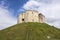 Wide angle shot of the York Castle - Cliffords Tower - against a