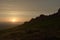 Wide angle sunset at stanage edge, with many people outdoors at sunset