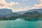 Wide angle view of Bled lake with mountains, island and pilgrimage church, view from the Bled Castle upper yard