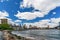 Wide angle view Brooklyn Bridge with lower Manhattan skyline, One World Trade Center Empire Fulton Ferry Park