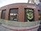 Wide angle view building with scary face mural