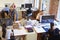 Wide Angle View Of Busy Design Office With Workers At Desks