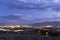 Wide angle view of the city of Reno during a wind and dust storm causing low visibility and glowing halos around each light