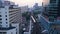 Wide angle view of elevated monorail train, passing between skyscrapers in Shimbashi Financial district. View from the