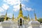 Wide angle view ,Golden pagodas in Mon-style Chedi of Wat Chedi Thong,
