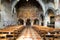 Wide angle view of the interior of the church Santa Maria degli Angioli with nave and Renaissance fresco in Lugano Switzerland