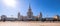 Wide angle view of spring sunny campus of Moscow University under blue sky