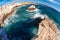 Wide angled shot of rocky coast with caves near Agia Napa, Cyprus