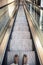 Wide angled view to perspective escalators stairway.