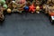 Wide arch shaped Christmas decoration border. Twigs christmas tree, brown natural pine cones and and Xmas deer with variety of