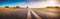 Wide asphalt road panorama in countryside on summer day.