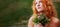 Wide banner panorama portrait of beautiful young sexy redhead girl with longing questioning, asking, suffering look, with a