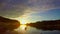 Wide beautiful river at sunset, tourists paddling boat. Slowmo