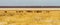 A wide-cropped view of a herd of Wildebeest on the edge of the huge salt pan central to the Etosha Wildlife Reserve in Namibia. I