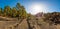 Wide footpath leading through spectacular volcanic landscape.