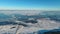 Wide frozen river and bridge with a bird`s-eye view.