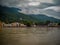 Wide ganga river at rishikesh india, ganga river with hills & clouds, ganga river view