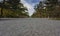 A wide gravel walking road in Kyoto park