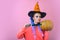 Wide Halloween party art design. Holiday halloween with funny carnival costumes on a holiday background. Beautiful young