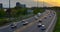 Wide highway captured from air cars in constant motion weaving tapestry of traffic Highway reflects dynamic traffic life