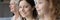 Wide image head shot smiling woman with daughter and mother