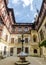 Wide interior courtyard view from the Peles Castle in Romania