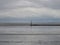 The wide landscape view of watt, sand and water of the northern sea in norddeich mole germany