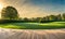 Wide lawn trimmed with precision under a sunset sky