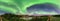 Wide Panorama Aurora borealis, Northern green lights with lot stars in the night sky over mountain lake, mirrored reflection in